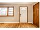 Living room with hardwood floors and neutral walls at 8415 E 10Th St, Indianapolis, IN 46219