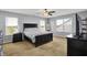 Bright bedroom featuring a large bed, ample natural light, and modern decor at 977 Capricorn Dr, Franklin, IN 46131