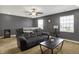 Comfortable living room with carpet flooring, fan, and plenty of natural light at 977 Capricorn Dr, Franklin, IN 46131