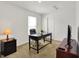 Bright office space with a large desk, comfortable chair, and ample natural light at 977 Capricorn Dr, Franklin, IN 46131