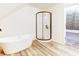 Bathroom with walk-in shower and freestanding tub at 1022 Villa Ave, Indianapolis, IN 46203