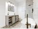 Modern bathroom with double vanity, freestanding tub, and shower at 1022 Villa Ave, Indianapolis, IN 46203