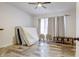 Spacious bedroom with hardwood floors and large windows at 1022 Villa Ave, Indianapolis, IN 46203