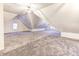 Spacious bonus room with grey carpet and skylights at 1022 Villa Ave, Indianapolis, IN 46203