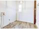 Empty laundry room with vinyl wood flooring at 1022 Villa Ave, Indianapolis, IN 46203