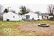 Spacious backyard with detached garage and firepit at 120 Hoss Rd, Indianapolis, IN 46217