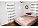Cozy bedroom with double bed and wood floors at 120 Hoss Rd, Indianapolis, IN 46217