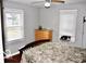 Bright bedroom with wood flooring and window seat at 120 Hoss Rd, Indianapolis, IN 46217