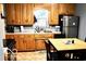 Bright kitchen with wood cabinets and appliances at 120 Hoss Rd, Indianapolis, IN 46217