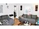 Living room with gray sofas and view to dining area at 120 Hoss Rd, Indianapolis, IN 46217