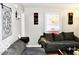 Living room with gray couch and window at 120 Hoss Rd, Indianapolis, IN 46217
