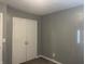 Bedroom with double closet and gray walls at 1360 S Cherry St, Martinsville, IN 46151