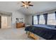 Main bedroom with high ceiling, ample natural light, and carpeted floor at 14027 Honey Tree Dr, Carmel, IN 46032