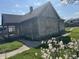 Side view of a rustic wood house needing some repairs at 1520 N Bancroft St, Indianapolis, IN 46201