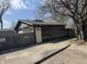 Small wooden garage with a single door, needing some work at 1520 N Bancroft St, Indianapolis, IN 46201