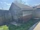 Small wooden shed in need of repair, located in the backyard at 1520 N Bancroft St, Indianapolis, IN 46201