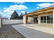 Large backyard with a covered patio, gravel accents, privacy fence and well-maintained landscaping at 201 S Mckinley St, North Salem, IN 46165