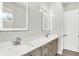 Elegant bathroom with double vanity and lighted mirrors at 201 S Mckinley St, North Salem, IN 46165