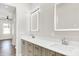 Clean bathroom with double vanity and a large mirror at 201 S Mckinley St, North Salem, IN 46165