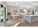 Modern kitchen with an island, stainless steel appliances, and hardwood floors at 201 S Mckinley St, North Salem, IN 46165