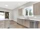 Contemporary kitchen with stainless steel appliances and ample counter space at 201 S Mckinley St, North Salem, IN 46165