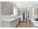 Modern kitchen featuring stainless steel appliances and light wood cabinets at 201 S Mckinley St, North Salem, IN 46165