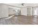 Open concept living room with kitchen view and hardwood floors at 201 S Mckinley St, North Salem, IN 46165
