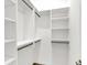 Spacious walk-in closet with ample shelving and hanging rods at 201 S Mckinley St, North Salem, IN 46165