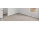 Cozy bedroom with natural light and neutral carpeting; view to the walk-in closet at 2310 Marjorie Way, Shelbyville, IN 46176