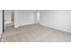 Expansive bedroom featuring plush carpeting, neutral walls, and abundant natural light at 2310 Marjorie Way, Shelbyville, IN 46176