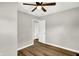 Bedroom with ceiling fan and access to hallway at 2319 N Rural St, Indianapolis, IN 46218