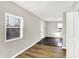 Living room with dark hardwood floors and neutral walls at 2319 N Rural St, Indianapolis, IN 46218