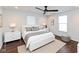 Spacious bedroom with hardwood floors, ceiling fan and neutral decor at 2320 Spann Ave, Indianapolis, IN 46203