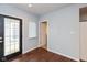 Sunlit entryway with exterior door and access to a bathroom at 2320 Spann Ave, Indianapolis, IN 46203