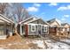 Charming craftsman style home with gray siding and a landscaped yard at 2320 Spann Ave, Indianapolis, IN 46203
