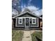 Charming single-story home with gray siding, a front yard, and a well-manicured lawn at 2320 Spann Ave, Indianapolis, IN 46203