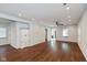 Large living room with hardwood floors and ceiling fan at 2320 Spann Ave, Indianapolis, IN 46203