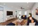 Spacious living room featuring hardwood floors and stylish furniture at 2320 Spann Ave, Indianapolis, IN 46203