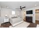 Spacious main bedroom with a large TV, dresser and ensuite bathroom at 2320 Spann Ave, Indianapolis, IN 46203