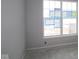 Unfurnished bedroom with gray walls and large window at 3617 Wrangler Dr, Bargersville, IN 46106