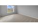 Bright bedroom with large window offering neighborhood views at 3617 Wrangler Dr, Bargersville, IN 46106