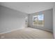Neutral bedroom with two windows and neighborhood view at 3617 Wrangler Dr, Bargersville, IN 46106