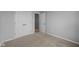 Bedroom with carpet and double closets, with a doorway to a different room at 3617 Wrangler Dr, Bargersville, IN 46106