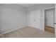 This is a bedroom with neutral carpeting, light gray walls, and a closet with bi-fold doors at 3617 Wrangler Dr, Bargersville, IN 46106