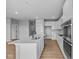 Gourmet kitchen featuring stainless steel appliances, an island, and modern finishes at 3617 Wrangler Dr, Bargersville, IN 46106