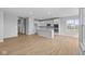 Bright living room featuring wood floors and large windows providing plenty of natural light at 3617 Wrangler Dr, Bargersville, IN 46106