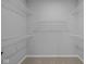 Spacious walk-in closet featuring wire shelving and neutral carpeting at 3617 Wrangler Dr, Bargersville, IN 46106