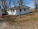 White house exterior with grey roof and small yard at 450 N Border St, Paragon, IN 46166