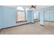 Blue bedroom with window, mirrored closet and carpet at 4669 Stansbury Ln, Indianapolis, IN 46254