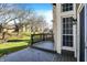 Back deck overlooks the spacious yard and mature trees at 4669 Stansbury Ln, Indianapolis, IN 46254